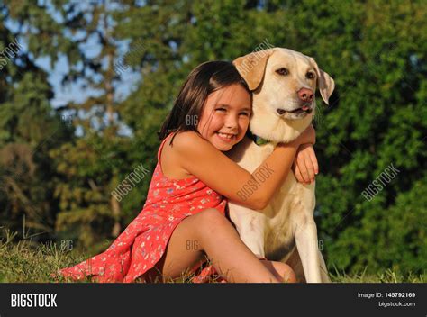 Happy Child Hugging Image & Photo (Free Trial) | Bigstock