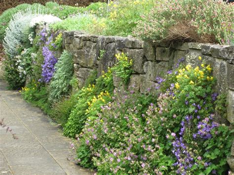 Rock wall gardens, Beautiful gardens, Sloped garden