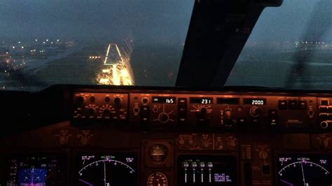 Cockpit View Landing at Schiphol with Stormy Weather on Runway 22 with ...