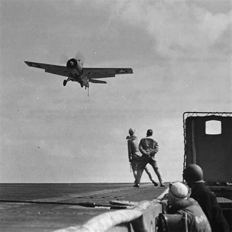 LSO Directs Grumman Wildcat F4F Landing on Carrier 1942 Operation Torch ...