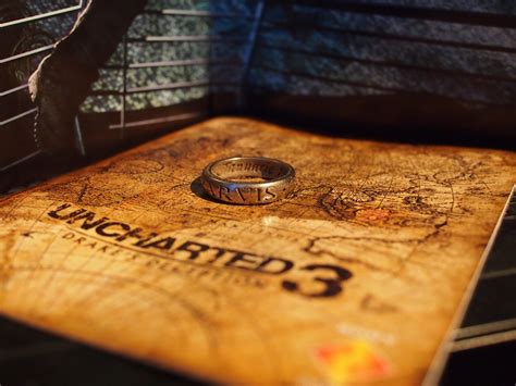 How does Nate still have his 'Sic Parvis Magna' ring in Uncharted 3 ...