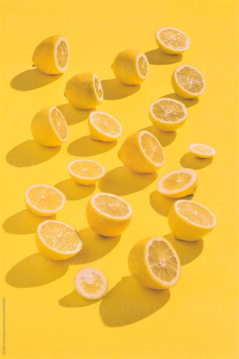 "Yellow Lemons On A Yellow Background" by Stocksy Contributor "Studio ...