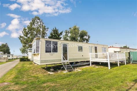 6 berth caravan with decking to hire in Steeple Bay holiday park, Essex ...