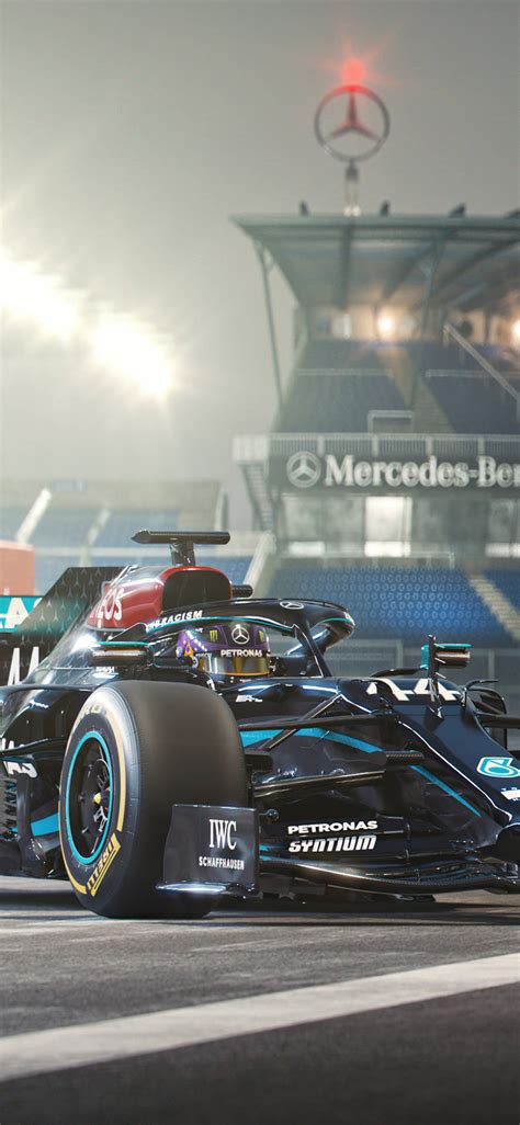 Download Mercedes F1 Iphone Racing Car Sideways Wallpaper | Wallpapers.com