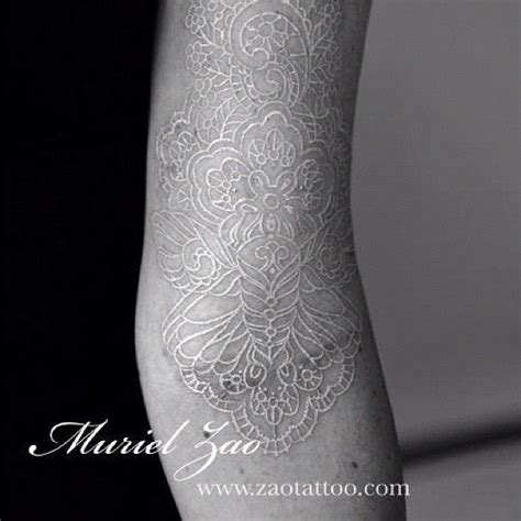 White ink lace tattoo