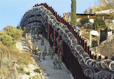 Latest: Border officials explain added wire to Nogales wall