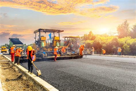 Construction site is laying new asphalt road pavement,road construction ...