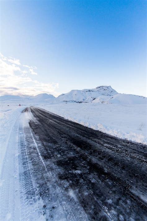 Black Road through Snow stock image. Image of iceland - 54392837