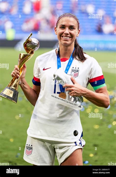 USA's Alex Morgan celebrates with the FIFA Women's World Cup Trophy and ...