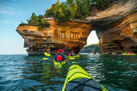 Kayakers paddle near and under Lovers’ Leap. Photo courtesy of Pictured ...