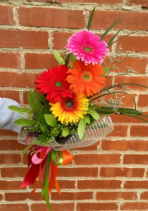 Gerberas wrapped for presentation bouquet in Pratt, KS | The Flower Shoppe