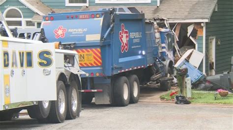 Garbage Truck Slammed Into a House & Destroys A Classic Car | wfmynews2.com