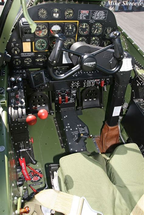 the cockpit of an airplane that is green and has many different ...