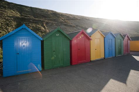 Brightly coloured beach huts in Whitby-7773 | Stockarch Free Stock Photos