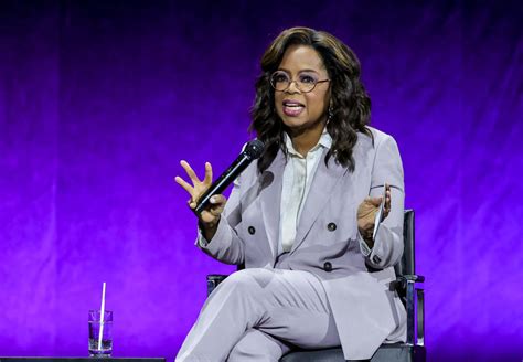 Oprah Winfrey Suits Up in Lavender for CinemaCon 2023