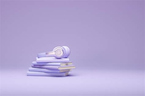 Premium Photo | Stack of books with headphones isolated on pastel ...