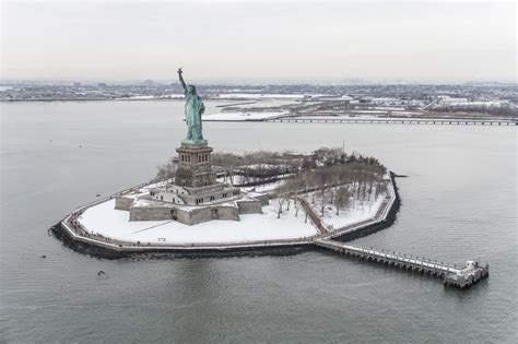 NYC Winter at the Statue of Liberty with FlyNYON. Doorless Helicopter ...