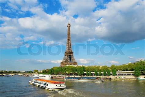 Eiffel tower with touristic boat on Seine | Stock image | Colourbox