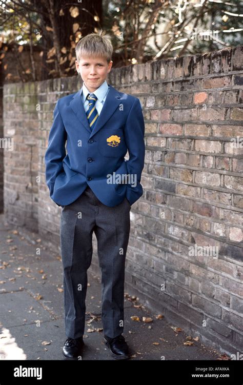 boy in uniform going to his first day at school Stock Photo - Alamy