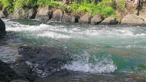 Steady shot of stream of water. Sport rafting on rivers. Beautiful view ...