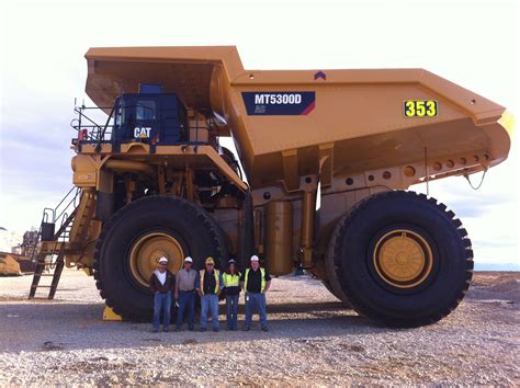 The new Cat MT5300 mining truck up at Kennocott. It is 28 ft tall, 33 ...