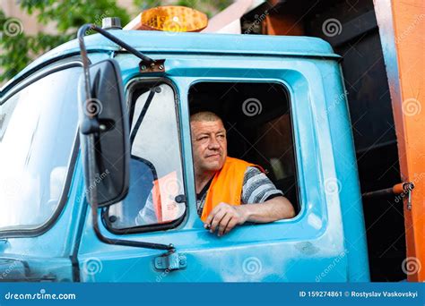 Garbage Truck Driver Smokes in the Truck Cab Editorial Photo - Image of ...