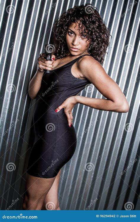 Woman Pointing Gun stock photo. Image of hair, hand, shoot - 96294942