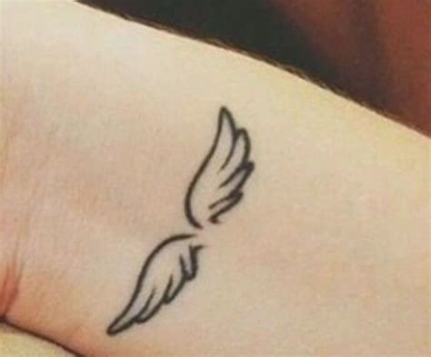 Angel Wing Tattoos | Wing tattoos on wrist, Small hand tattoos, Angel ...