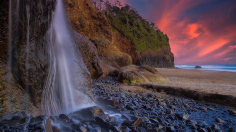 Oregon Pacific Ocean With Rock Stone And Waterfalls During Sunset HD ...