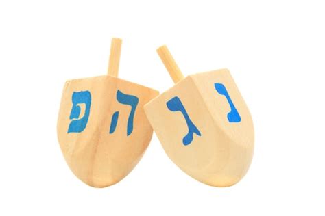 Why Do We Play With a Dreidel (Top) on Chanukah? - Chabad.org