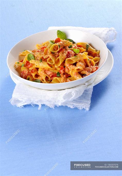 Penne pasta in tomato and cheese sauce — cookery, lifestyle - Stock ...