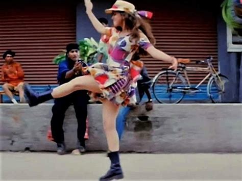 Urmila Matondkar’s Colourful Dress And Matching Cap From Rangeela Re ...