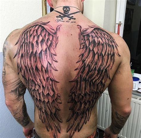 Pin by Julie Reilly on Tattoos | Back tattoos for guys, Wing tattoos on ...