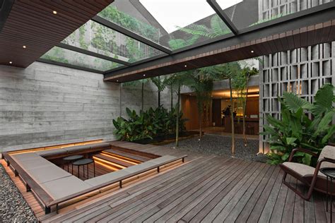 Courtyard Cwith covered sunken seating with glass ceiling Jakarta ...