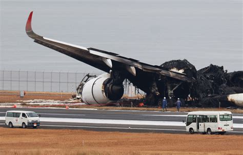 Concerns mount over runway technology gap as Japan probes crash | Reuters