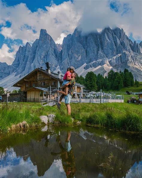 Geisler Alm, Dolomites Italy,couple Hiking in the Mountains of Val Di ...