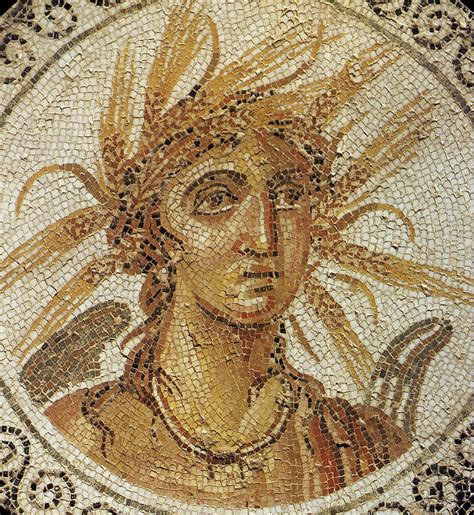 an ancient roman mosaic with a woman's head