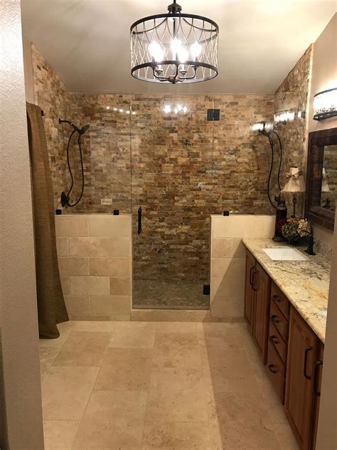 I love this bathroom!! The stacked stone shower surround, travertine ...