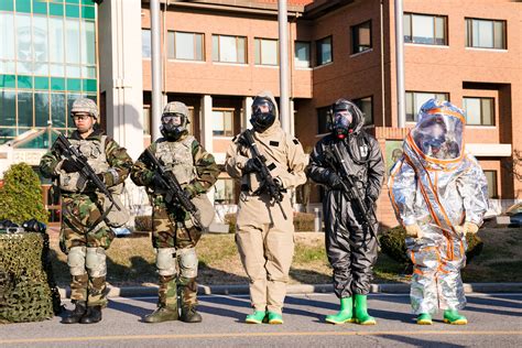 US Army soldiers from the 2nd Infantry Division showcasing CBRN gear ...