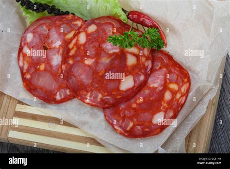 Chorizo sausage with pepper and salad leaves Stock Photo - Alamy