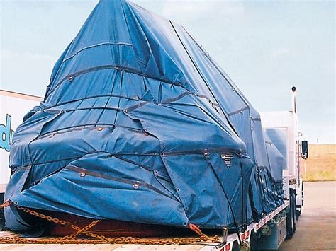 The Differences Between Flatbed Lumber Tarps and Steel Tarps | Lodi Metals