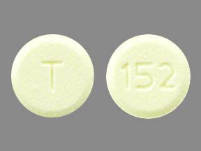 T 152 Pill Images (Yellow / Round)