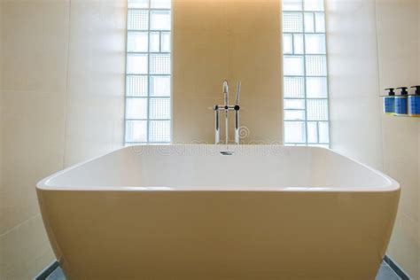 White Bathtub in a Luxury Hotel Room, Classic Bathroom Stock Image ...