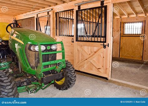 Farm Tractor In Barn Editorial Photo - Image: 6159291