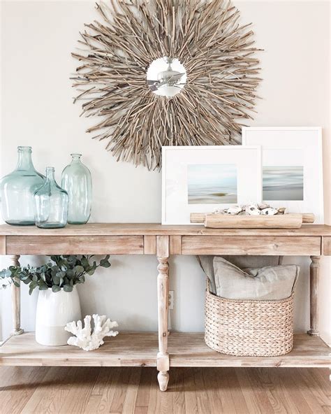 Leaning Art on a Coastal Console Table - Jennifer Squires Productions