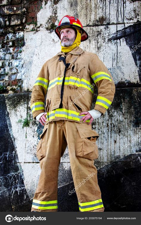 Portrait Handsome Fireman Uniform Standing Front Wall Stock Photo by ...