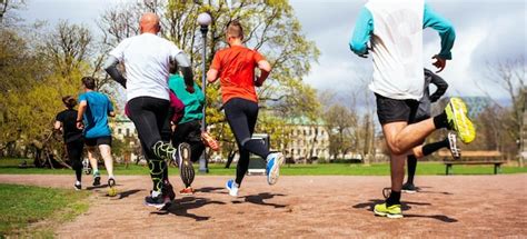 Premium Photo | Group of people running in the park. jogging concept