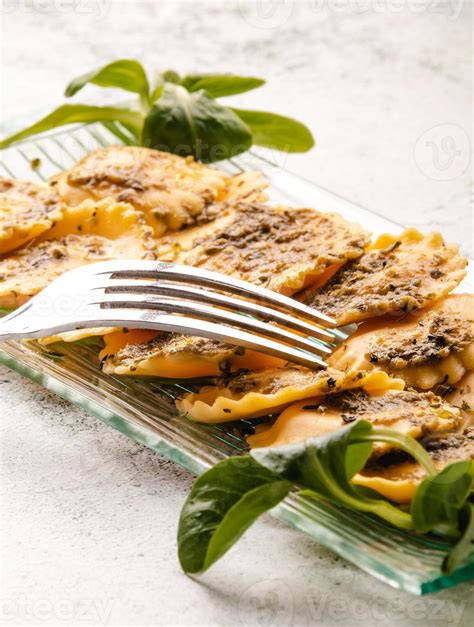 Italian stuffed pasta ravioli with pesto sauce 3955215 Stock Photo at ...