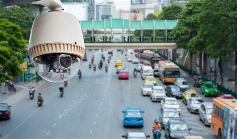 CCTV camera or surveillance operating on traffic road Stock Photo by ...