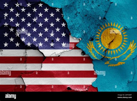 flags of USA and Kazakhstan painted on cracked wall Stock Photo - Alamy